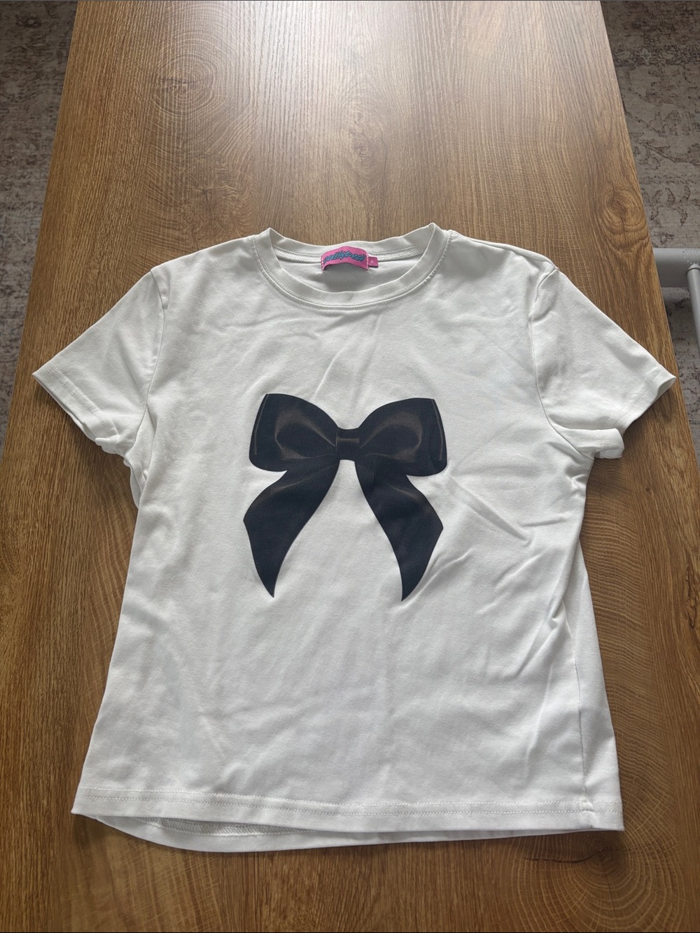Women’s White Tee with Black Bow Graphic